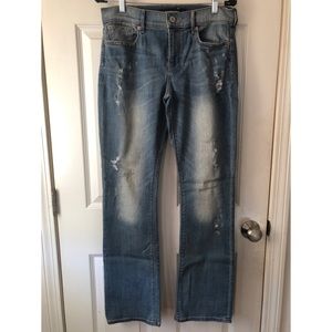EXPRESS distressed barely boot cut jeans.